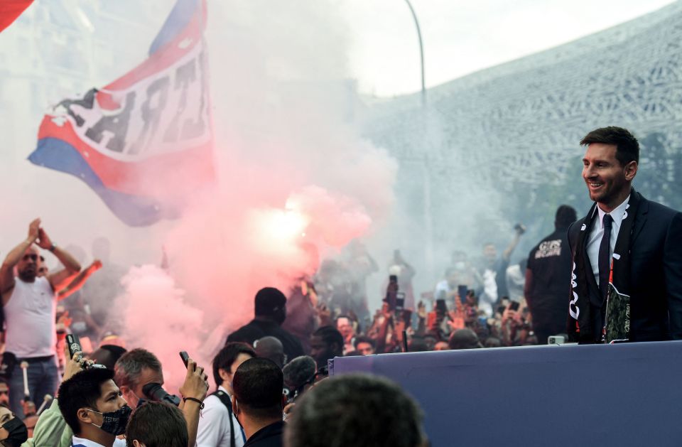 Lionel Messi was met by flare-waving fans as he was unveiled as a PSG player