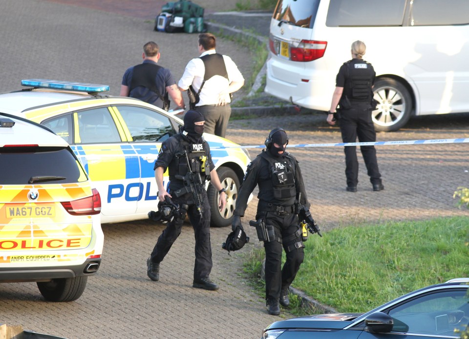 Armed officers could be seen on the scene of the bloodbath in Plymouth