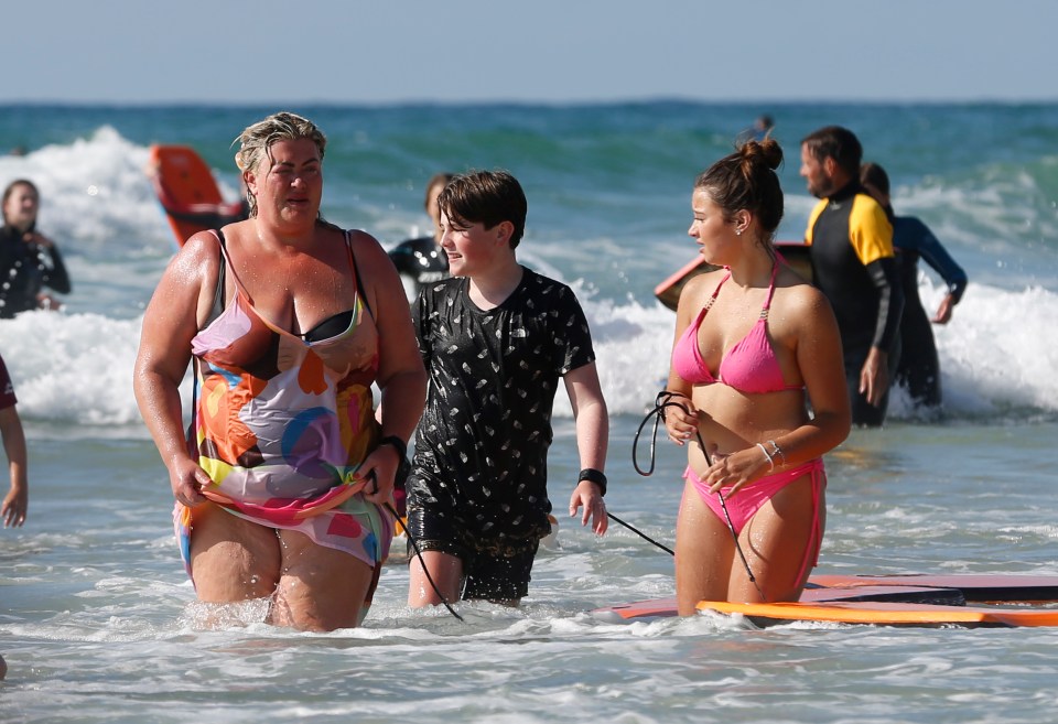 The 40-year-old star splashed around in the sea with her family during a bodyboarding session