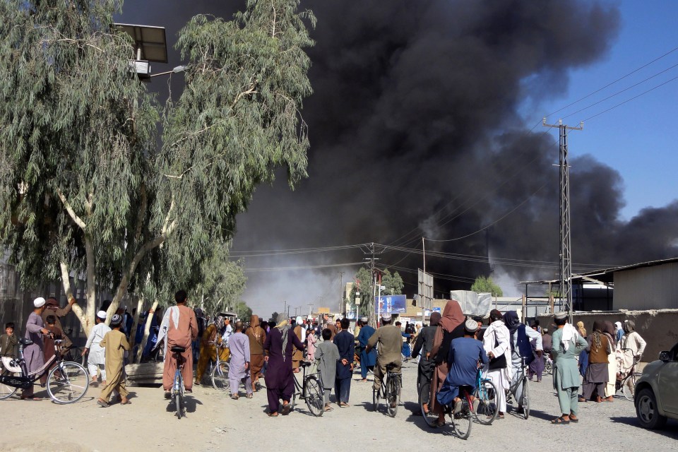 Smoke rises after fighting between the Taliban and Afghan security personnel, in Kandahar