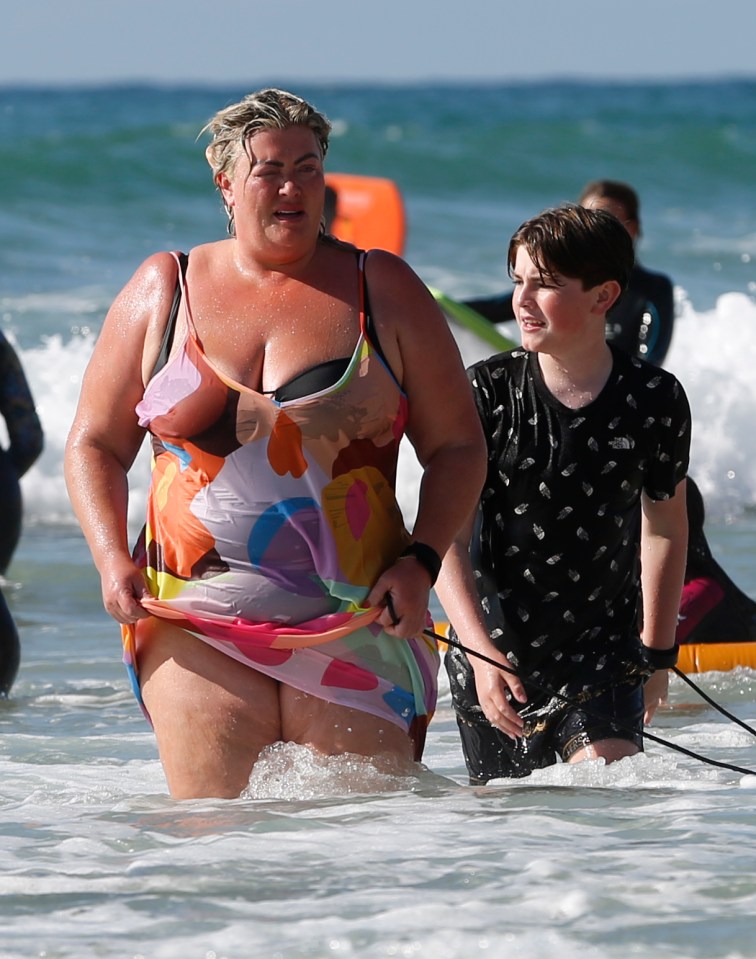 The pair pictured enjoying the surf in Cornwall last week