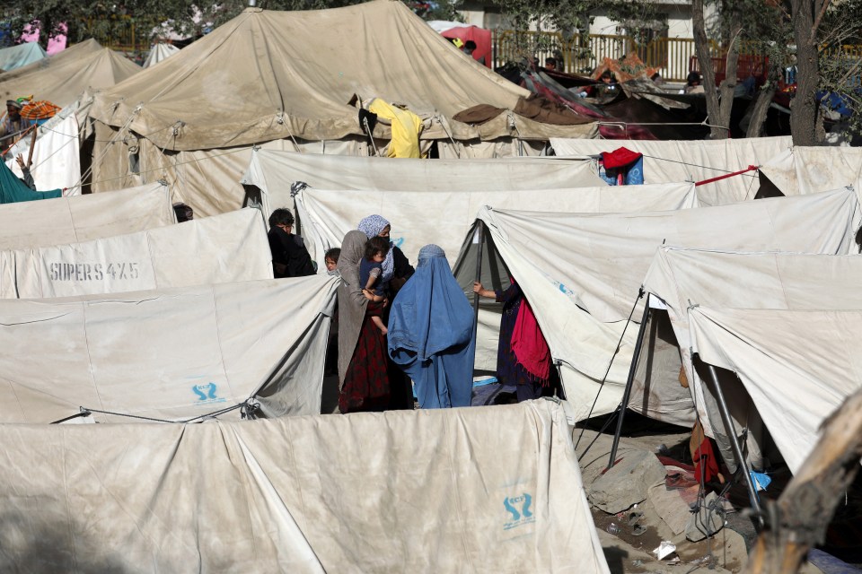 Internally displaced Afghans from northern provinces take refuge in a public park Kabul