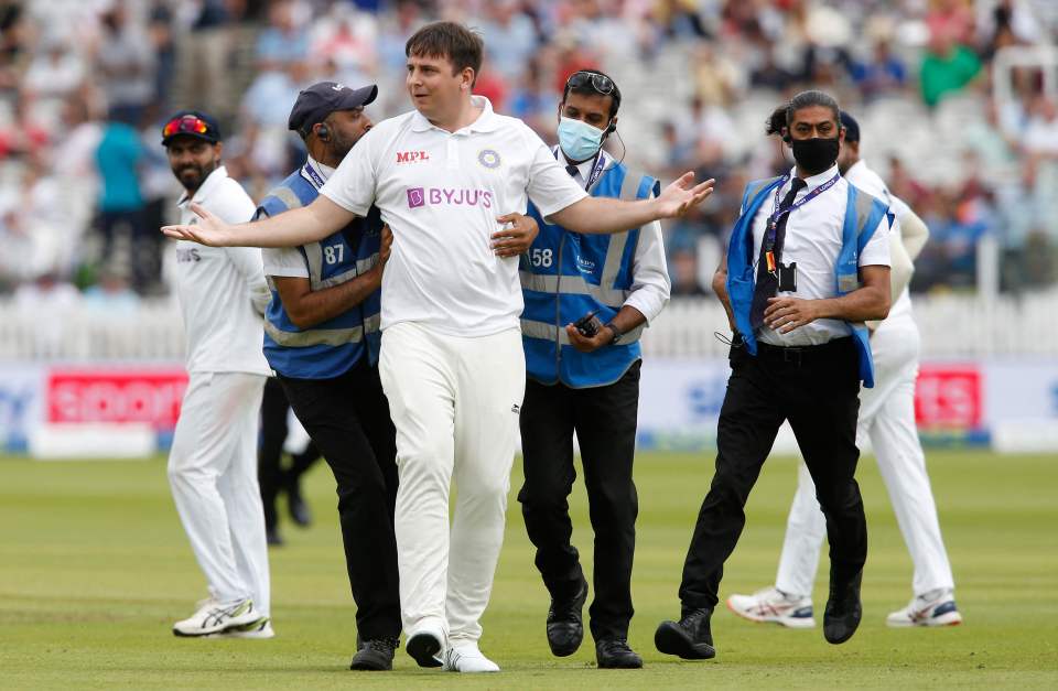 The fan was escorted off the Lord's pitch by stewards