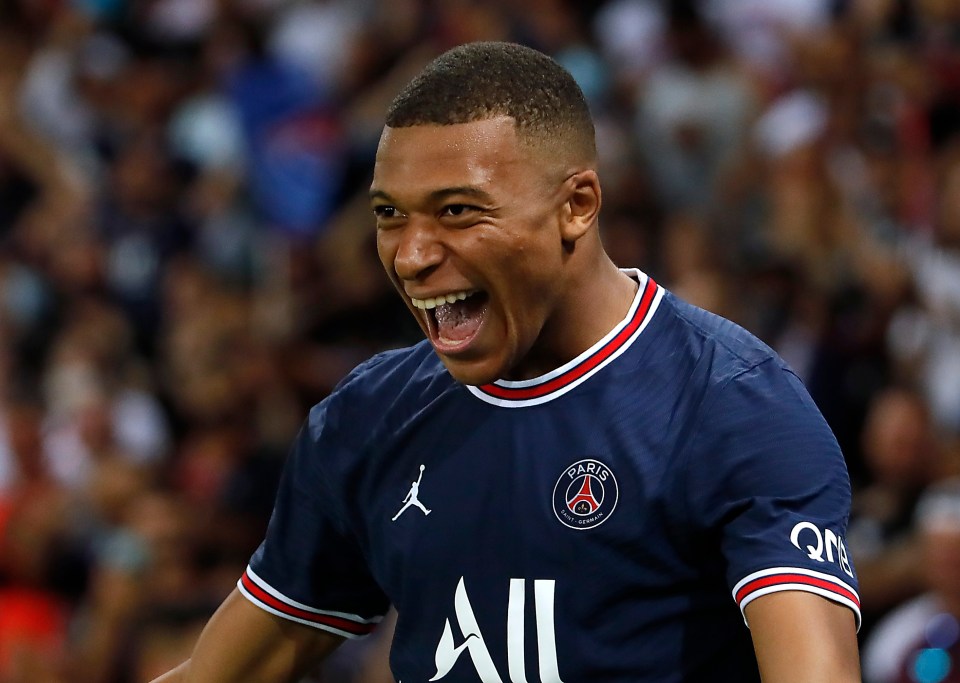 Kylian Mbappe celebrates scoring PSG's second