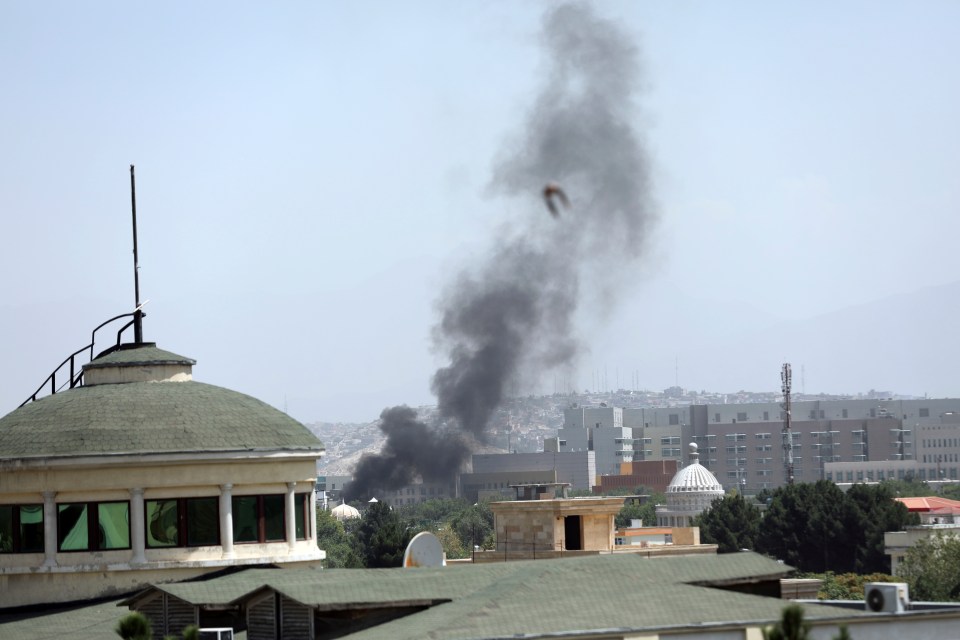 Smoke near the US embassy in Kabul as documents are burned