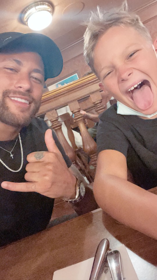 Neymar poses with his son