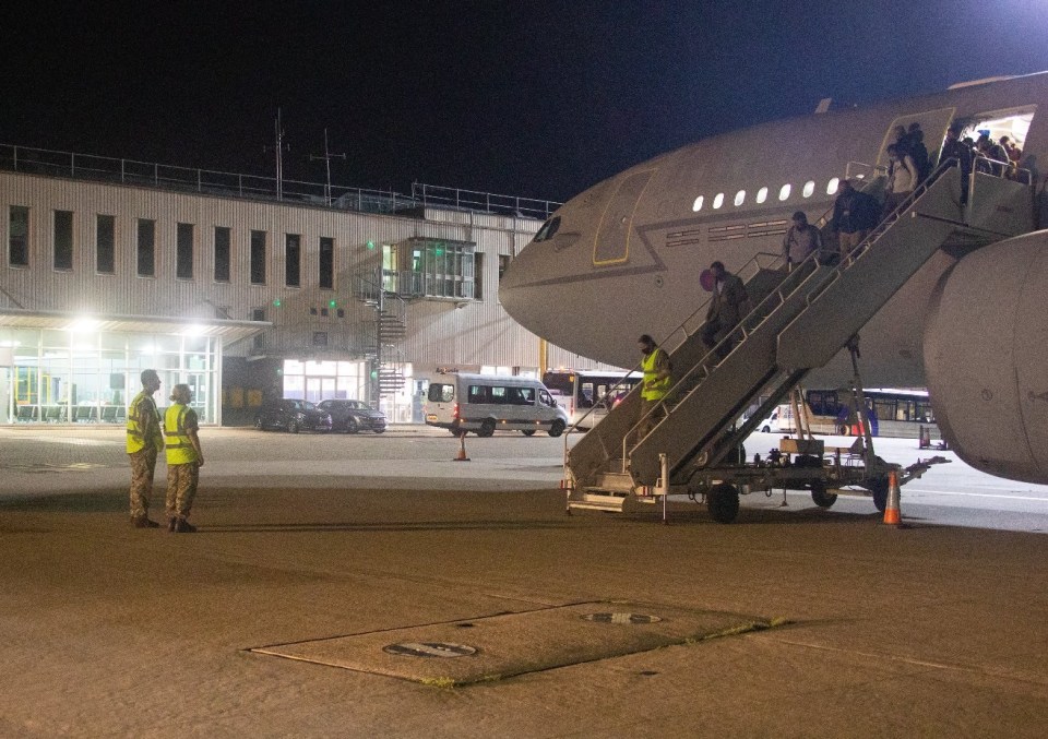 Brits arriving back at RAF Brize Norton after being evacuated