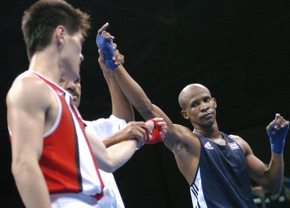 Yan Barthelemy Varela, right, of of Cuba in 2004