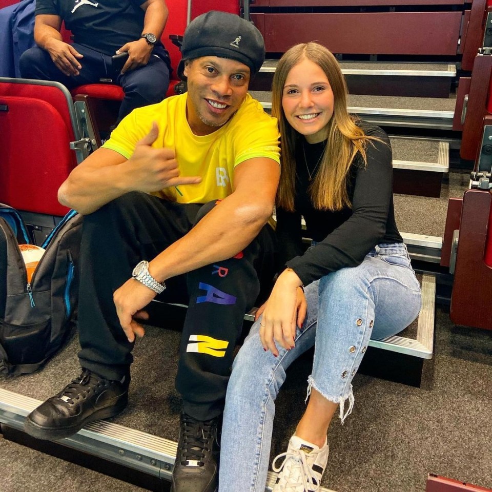 Olivia poses with Brazil legend Ronaldinho