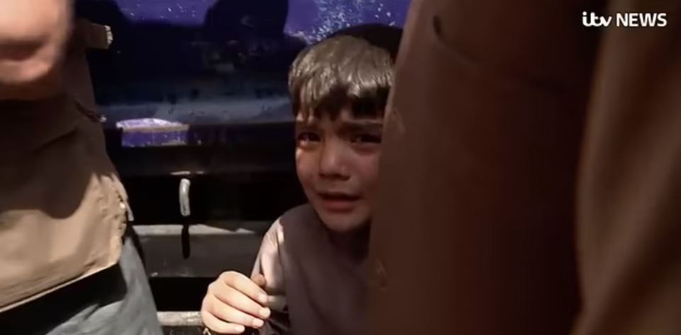 This crying boy was separated from his parents