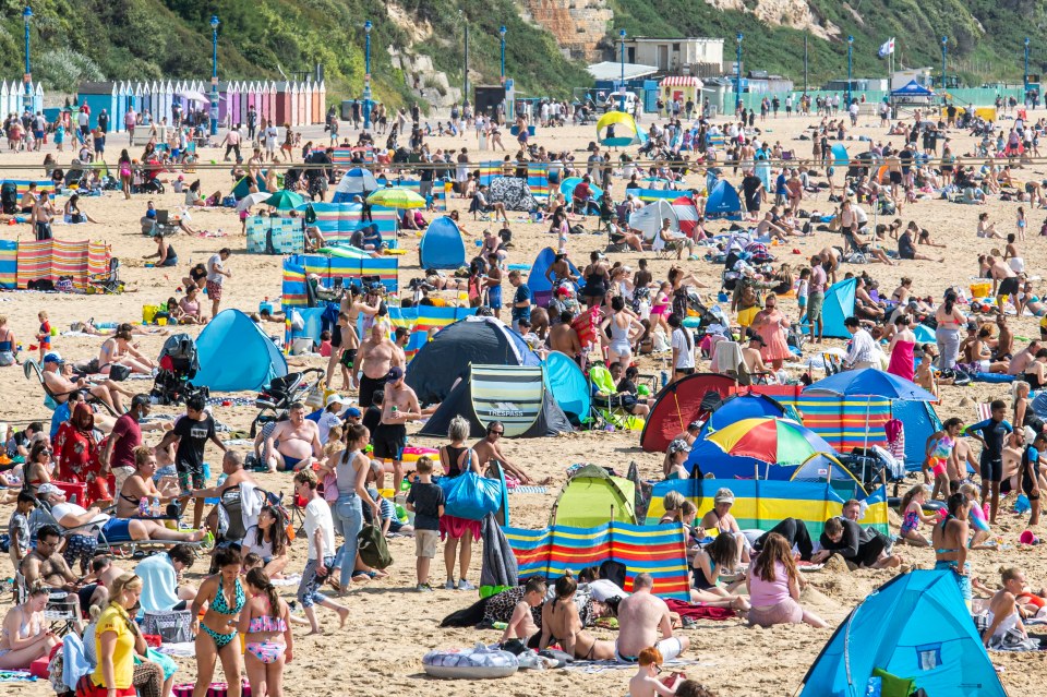 Sun-seekers flocked to the beaches of Bournemouth, Dorset