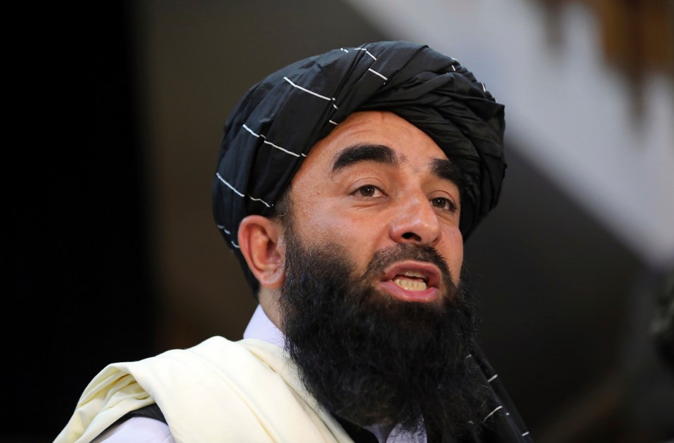 Taliban spokesman Zabihullah Mujahid at a press conference