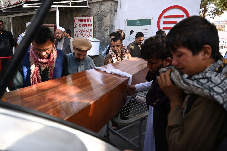 Afghans have already begun burying their dead from Thursday's terror attack