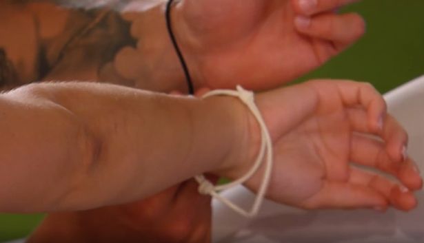 Jake and Liberty wore their bracelets everyday in the villa that they were together