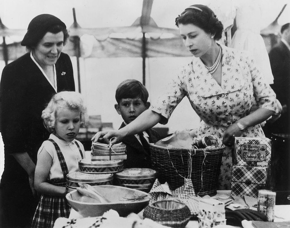 Her Majesty (pictured at Balmoral in 1955 with Prince Charles and Princess Anne) reportedly goes back to basics when up at her Scottish residence