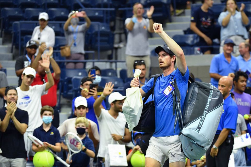 Andy Murray waves to the crowd after an incredible performance