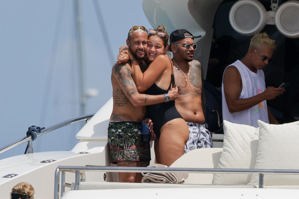 Neymar was spotted hugging ex Carol Dantas on a yacht as he holidays in Ibiza