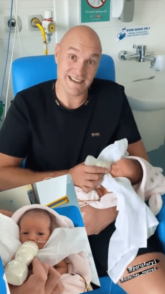 Tyson Fury holds baby Athena after her release from the ICU