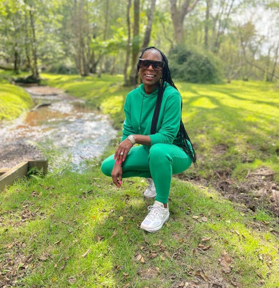 The Frenchman’s partner posed in a chic green tracksuit on a romantic walk