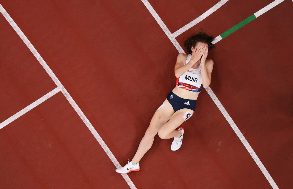 She was left stunned after crossing the line, collapsing to the floor and covering her face