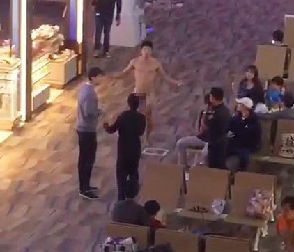 Police confronted a naked holidaymaker who said he had too much Viagra in a Thai airport