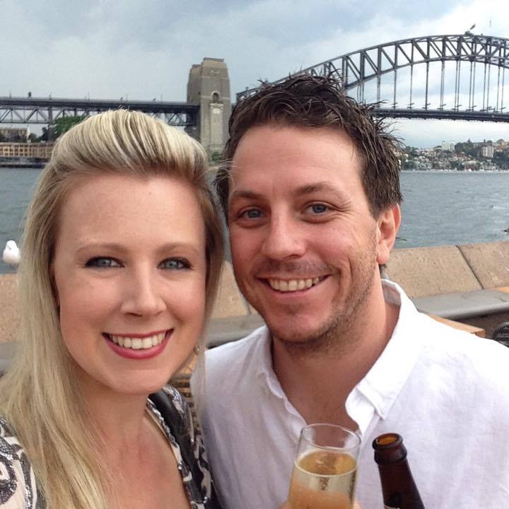 Matt Best with his wife Amanda enjoying drinks in front of the Sydney Harbour Bridge