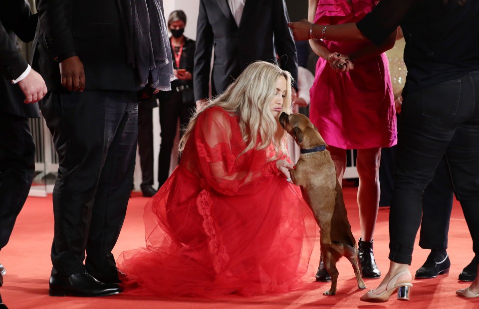 She took time out as film director Ana Lily Amirpour’s dog excitedly raced down the carpet to see her