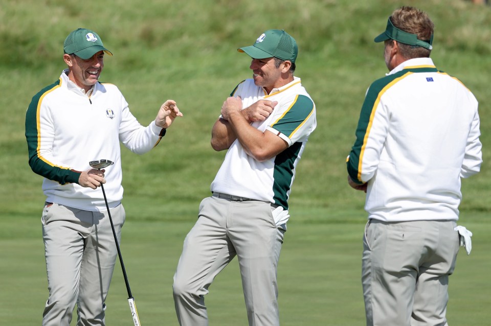 Ian Poulter with Rory McIlroy and Paul Casey on the course on Wednesday