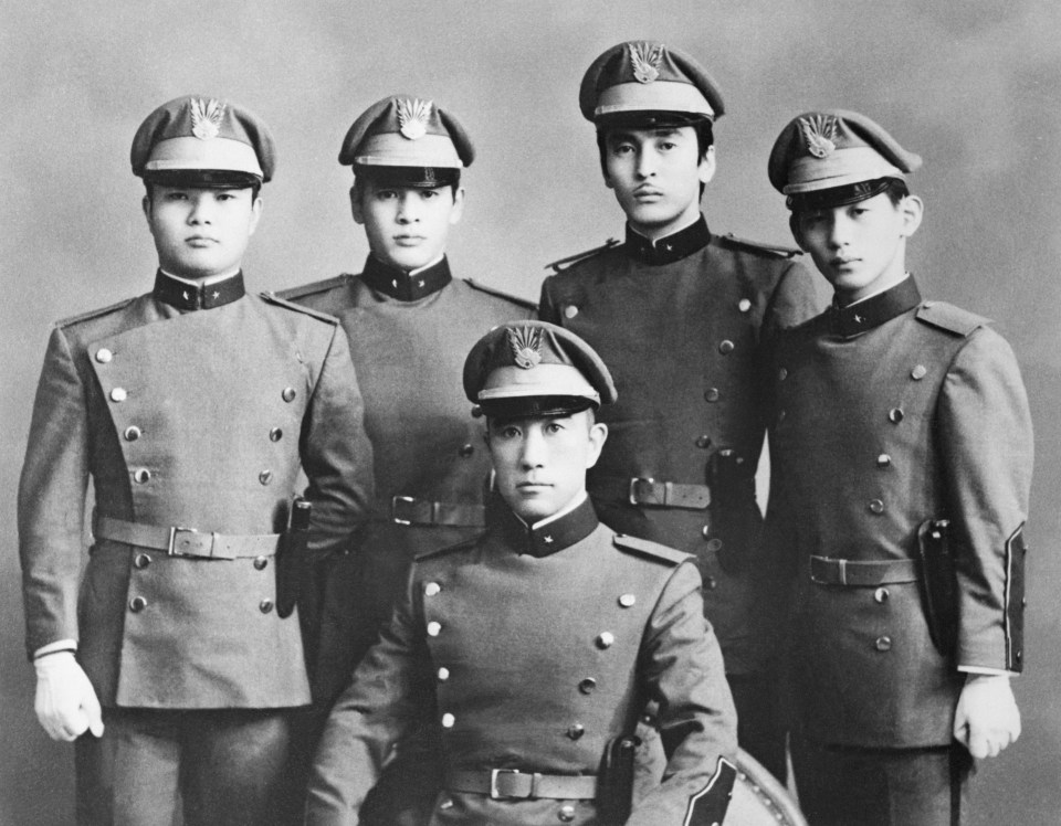 Mishima, centre, with the four men who helped with the failed coup attempt. Left to right: Hissho Morita, Hiroyasu Koga, Masahiro Ogawa, and Masayoshi Koga