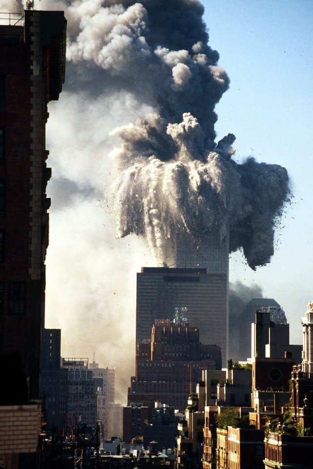 Smoke and debris billow from the World Trade Center North Tower as it collapses in the 2001 attack