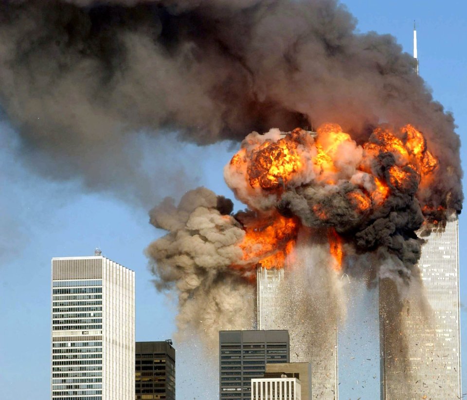 A fiery blast rocks New York's World Trade Center after being hit by two planes on September 11, 2001