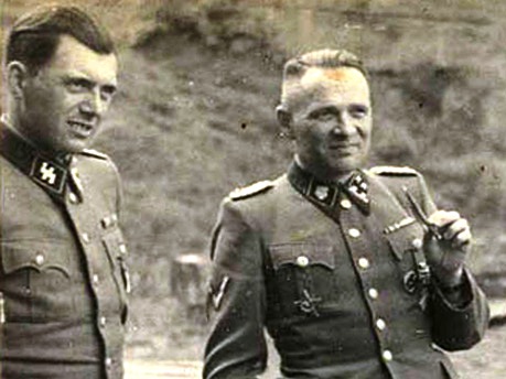 Dr Josef Mengele, left, with Auschwiz camp Commandent Rudolph Hoess