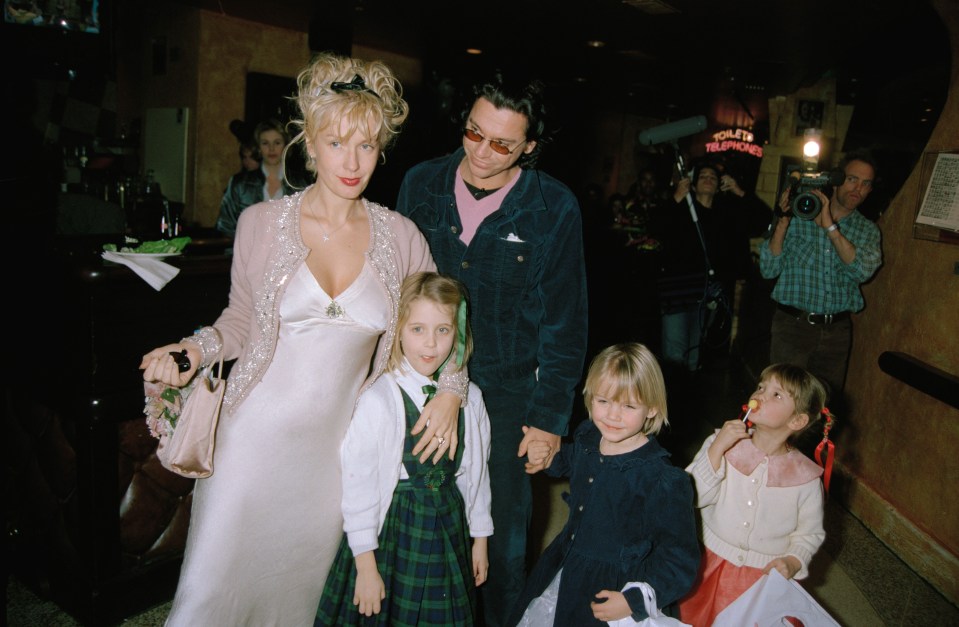 Paula, Michael and her kids at a film premiere in 1996