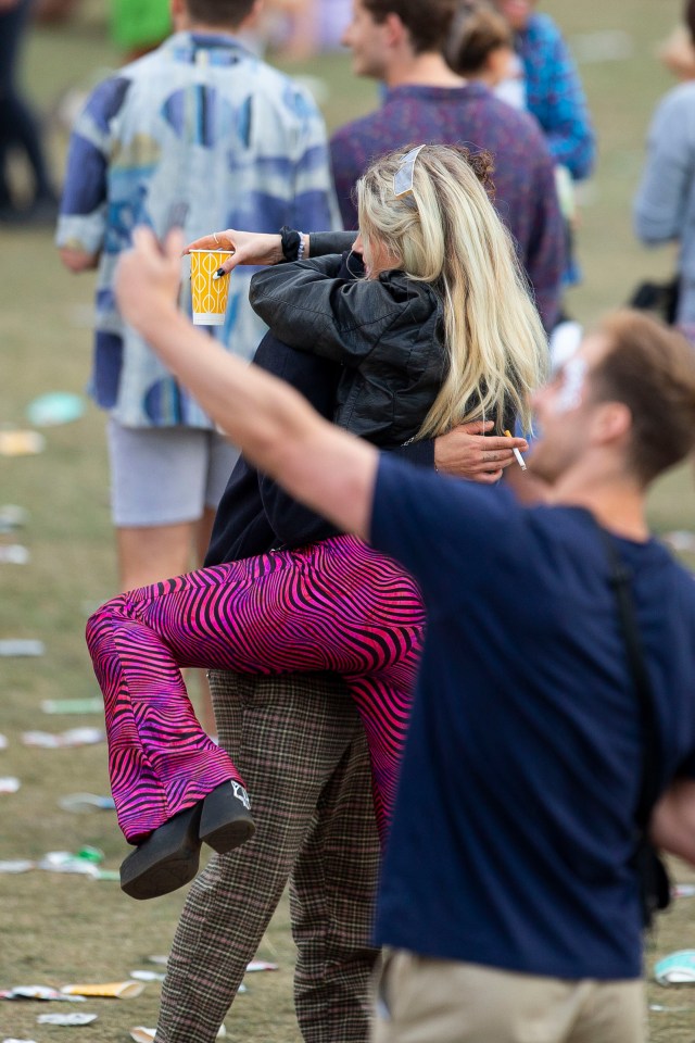 The pals put on an intimate display as they knocked back the booze during a wild weekend