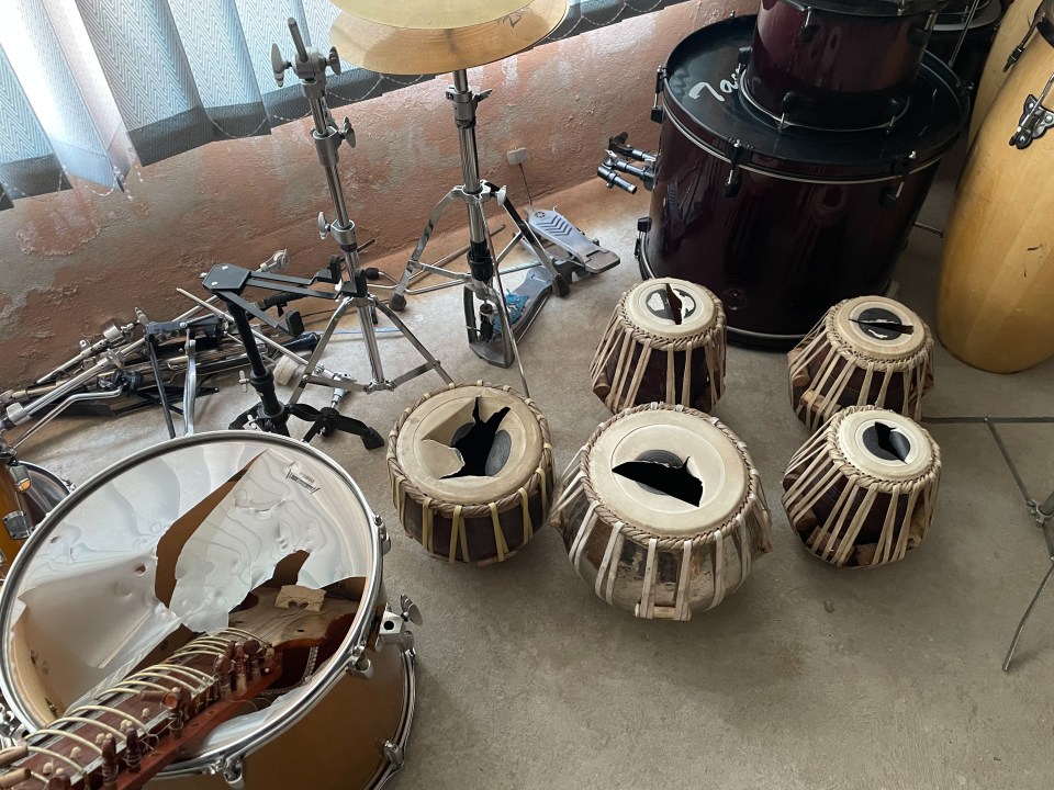 Sets of vandalised drums at the government music studio