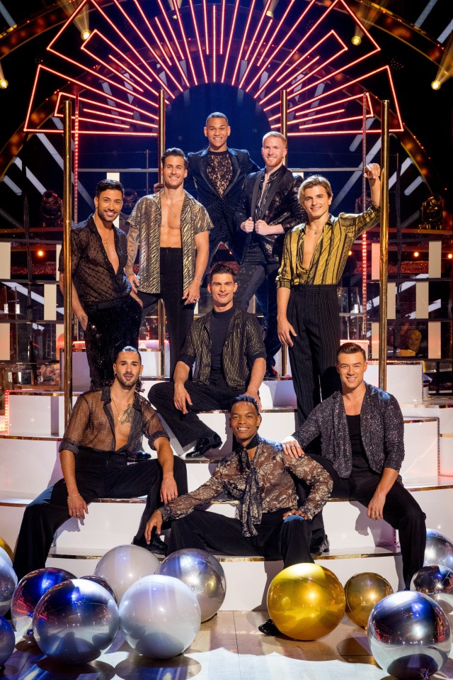 Neil Jones showed off a shaven head as he posed with the other male dancers