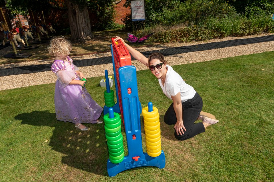 Emma was all smiles as she played with some of the children at the event