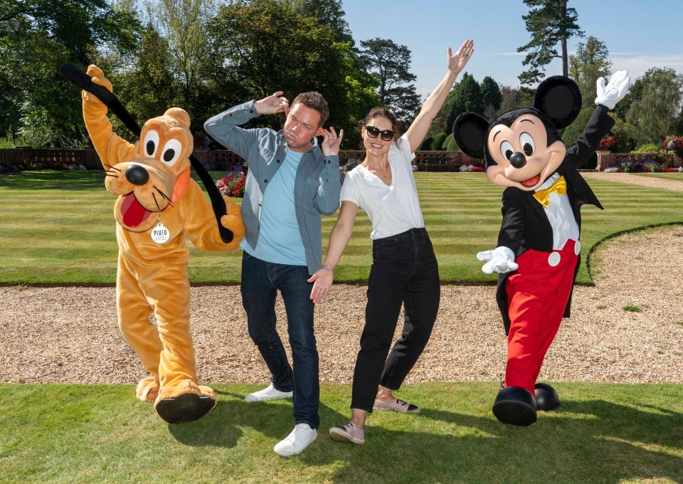 Emma and Stephen posed for photos with Mickey Mouse and Pluto