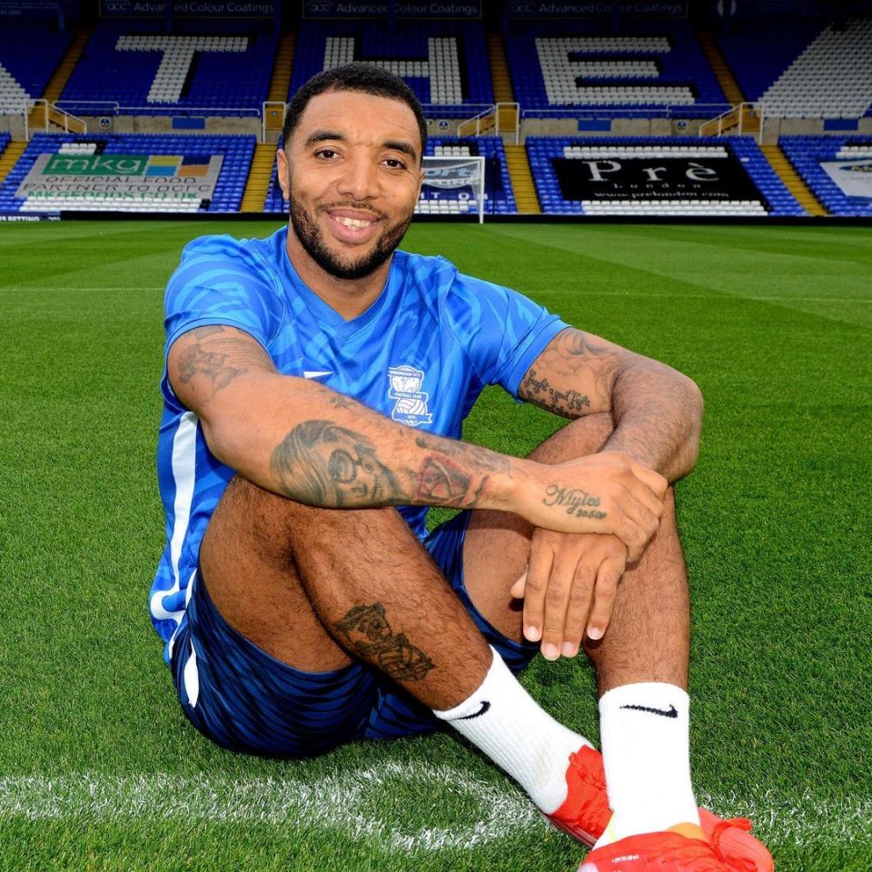 Troy Deeney - with Birmingham badge on his calf - should make his Blues debut on Friday