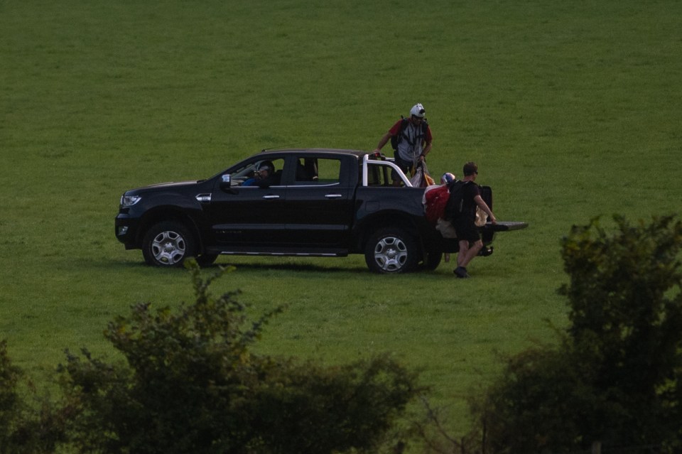 Production crew were spotted on the back of a SUV with equipment