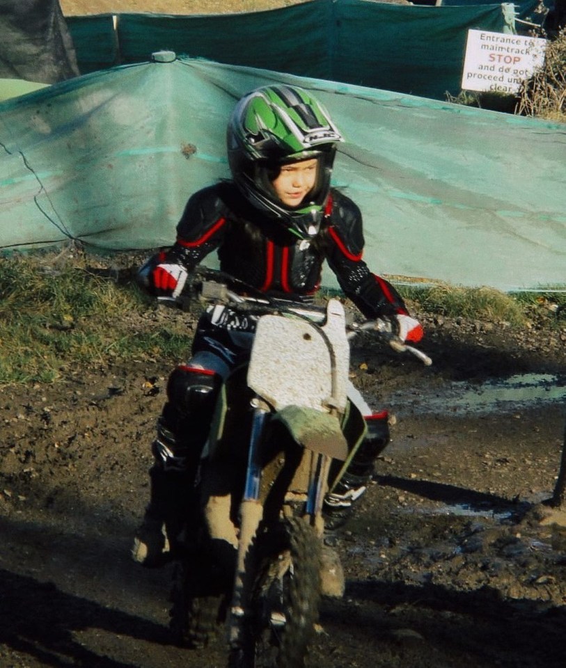 Emma already loving the adrenaline as a youngster as she rides a bike