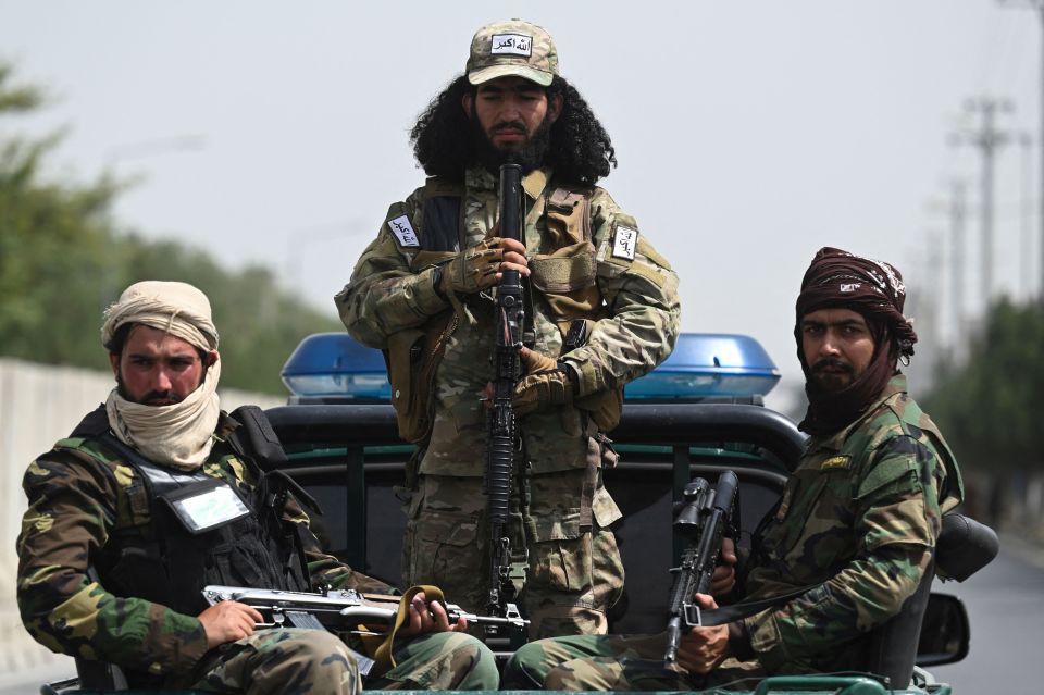 Taliban fighters are cracking down as they impose strict new laws