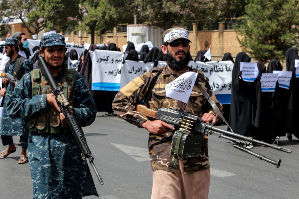 The women were escorted by armed Taliban fighters