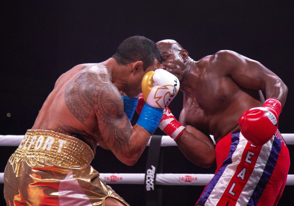 Evander Holyfield's comeback was over in less than two minutes as he was beaten by Vitor Belfort