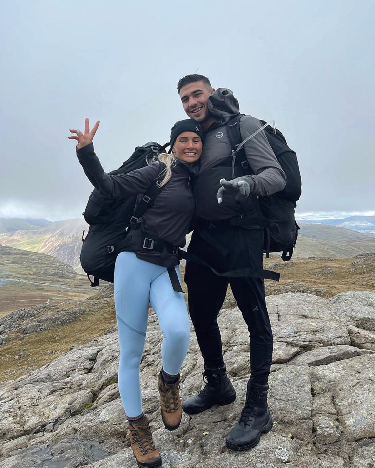 The hiked while carrying their huge backpacks