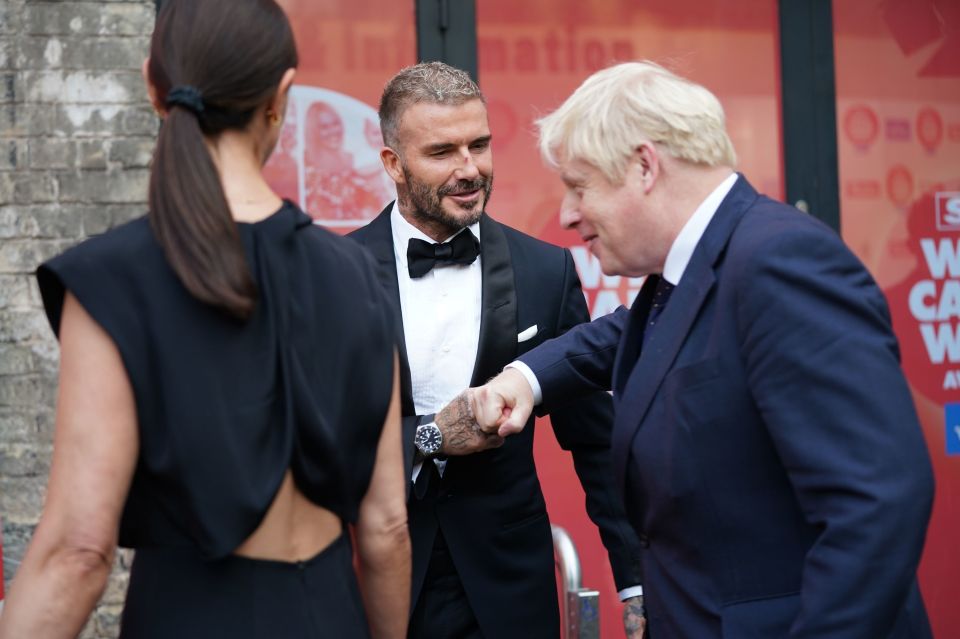 The football legend greeted Prime Minister Boris Johnson with a fist bump