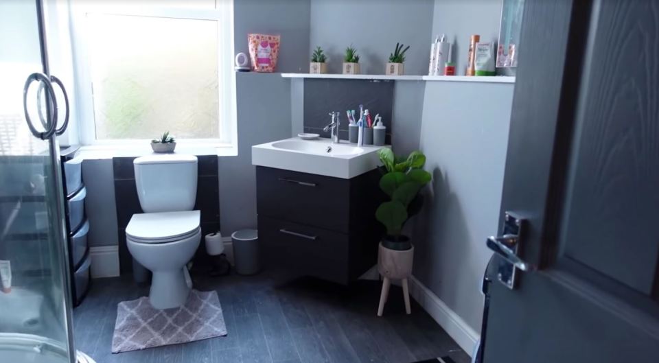 The family previously did up their bathroom with a floating sink and white shelf