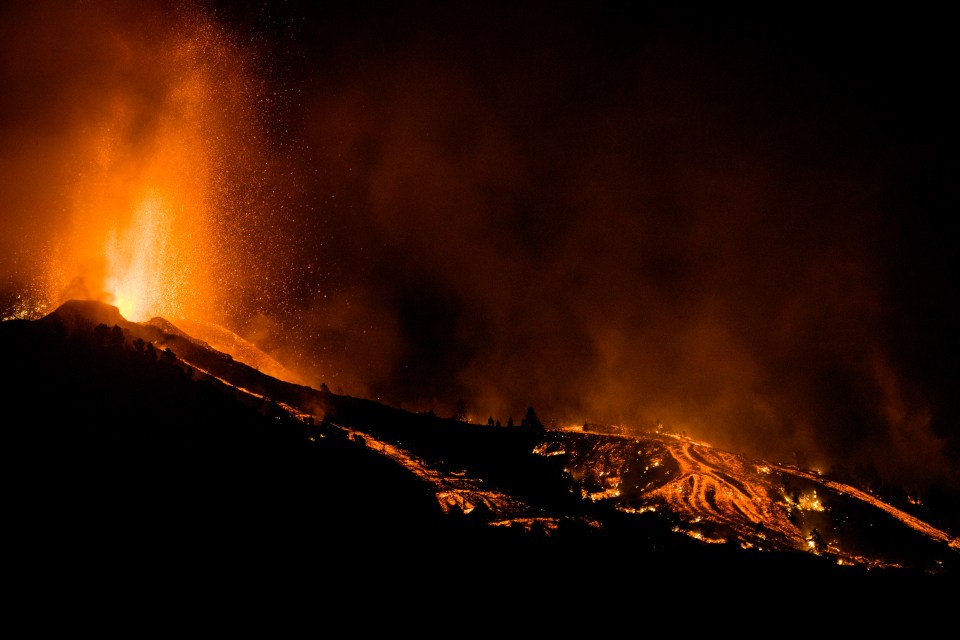 Red plumes shot out of the La Cumbre Vieja volcano