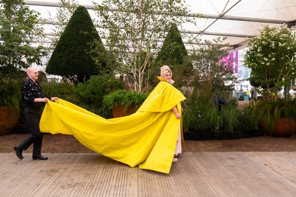 Gemma's cape was huge and needed an assistant to ensure it didn't drag on the floor