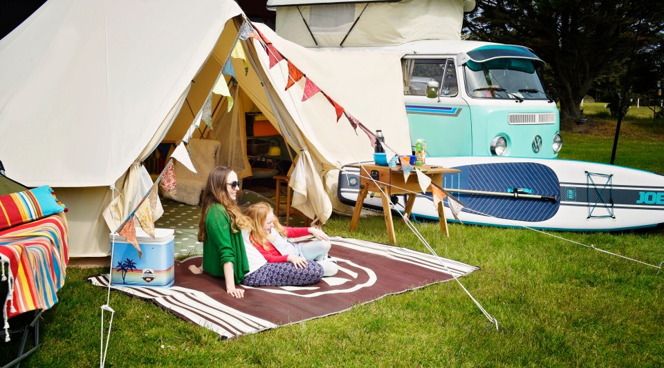 Glawning is a five-metre bell tent which attaches to a van, creating a vast living space/bedroom